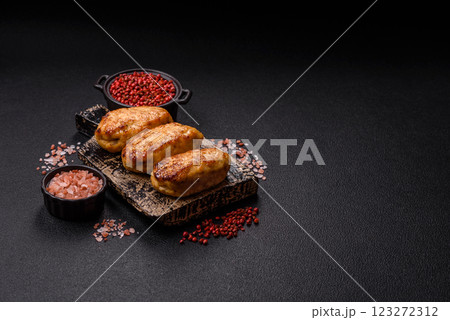 Delicious fresh fried minced fish cutlets with spices and herbs 123272312