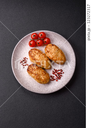 Delicious fresh fried minced fish cutlets with spices and herbs 123272317