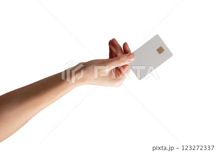 Female hand holding a blank credit card, showcasing it as a symbol of payment, promotion, or banking Female hand holding a blank credit card, showcasing it as a symbol of payment, promotion, or banking 123272337