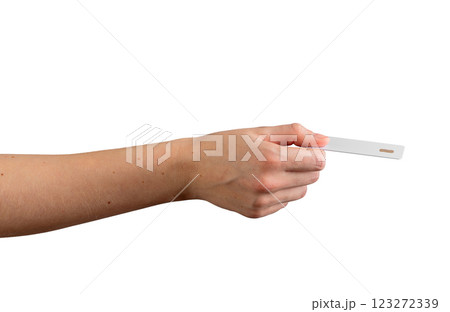 Female hand holding a blank credit card, slightly tilted to display financial services such as debit Female hand holding a blank credit card, slightly tilted to display financial services such as debit 123272339