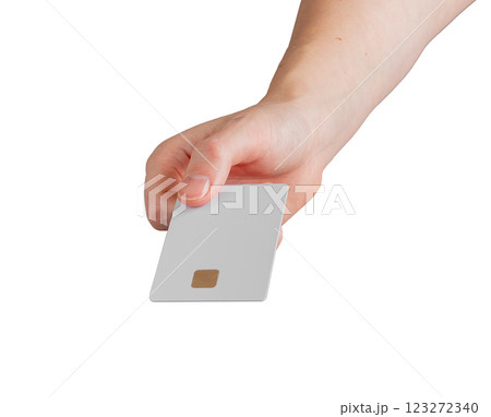 Female hand holding a blank credit card, slightly tilted to showcase payment and financial services. 123272340