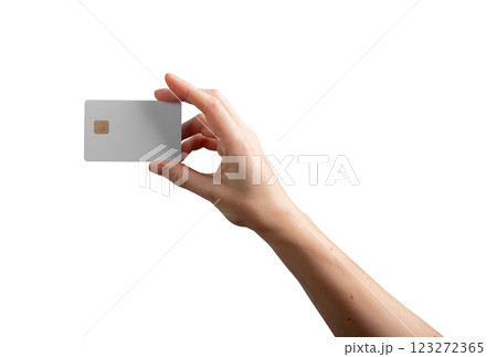 Female hand holding a credit card, showcasing it as a symbol of cashless payment, banking, or Female hand holding a credit card, showcasing it as a symbol of cashless payment, banking, or 123272365