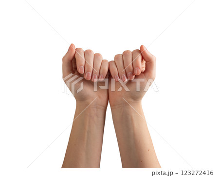 Female hands with glossy, polished nails, gently gesturing and demonstrating self-care and wellness. Female hands with glossy, polished nails, gently gesturing and demonstrating self-care and wellness. 123272416