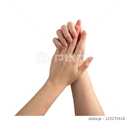 Female hands with glossy, well-groomed nails, elegantly demonstrating self-care and wellness. 123272418