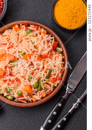 Boiled rice with vegetables, salt and spices Boiled rice with vegetables, salt and spices 123272440