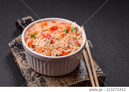 Boiled rice with vegetables, salt and spices Boiled rice with vegetables, salt and spices 123272452