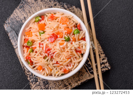 Boiled rice with vegetables, salt and spices Boiled rice with vegetables, salt and spices 123272453