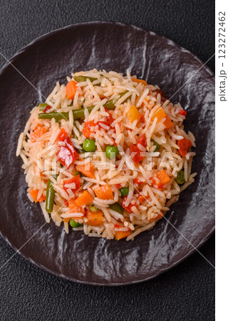 Boiled rice with vegetables, salt and spices Boiled rice with vegetables, salt and spices 123272462