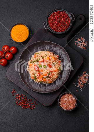 Boiled rice with vegetables, salt and spices 123272468