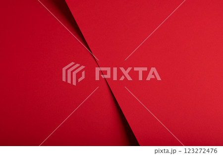 Bold scarlet red paper background with a deep matte texture and overlapping folds Bold scarlet red paper background with a deep matte texture and overlapping folds 123272476