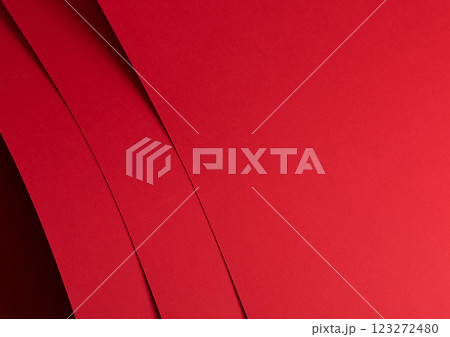 Bold scarlet red paper background with a deep matte texture and overlapping folds. Vibrant crimson 123272480