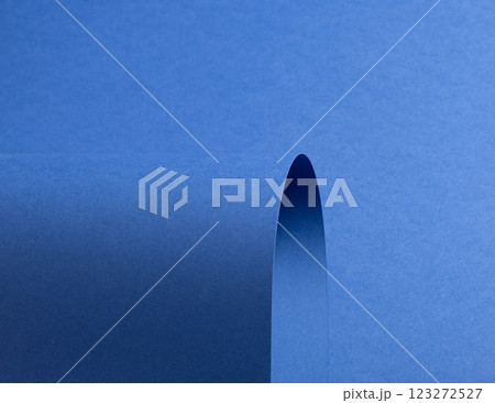 Deep sapphire blue paper background with a smooth texture and overlapping curved folds. Vibrant Deep sapphire blue paper background with a smooth texture and overlapping curved folds. Vibrant 123272527