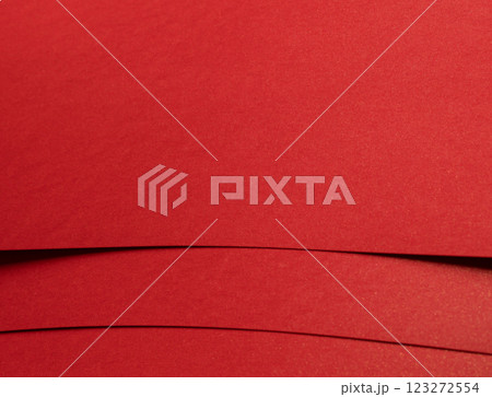 Fiery crimson paper background with a smooth texture and geometric lines. Rich scarlet tones and a Fiery crimson paper background with a smooth texture and geometric lines. Rich scarlet tones and a 123272554