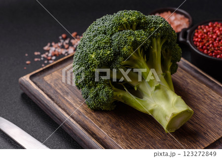 A sprig of raw green broccoli as an ingredient for a healthy meal 123272849