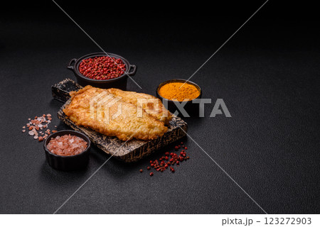 Grilled chicken or turkey chop with salt, spices and herbs Grilled chicken or turkey chop with salt, spices and herbs 123272903