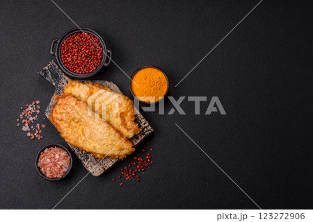 Grilled chicken or turkey chop with salt, spices and herbs 123272906