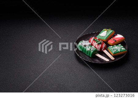 Natural popsicle ice cream on a stick in the style and colors of Christmas 123273016