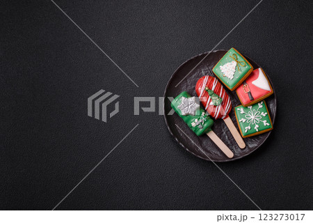 Natural popsicle ice cream on a stick in the style and colors of Christmas 123273017