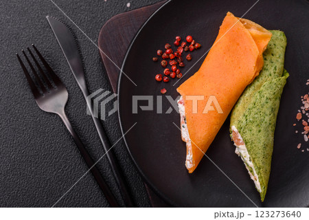 Crepes rolled with cream cheese sweet or sour Crepes rolled with cream cheese sweet or sour 123273640