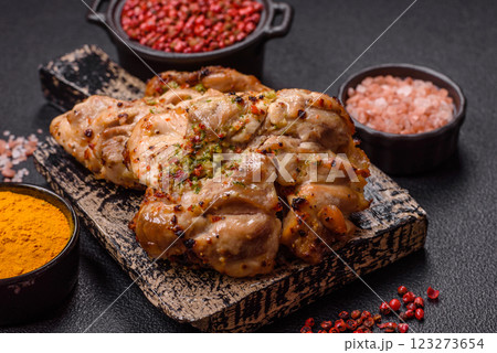 Grilled boneless chicken thigh with salt, spices and herbs 123273654