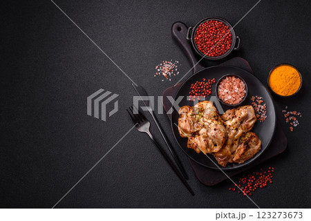 Grilled boneless chicken thigh with salt, spices and herbs Grilled boneless chicken thigh with salt, spices and herbs 123273673