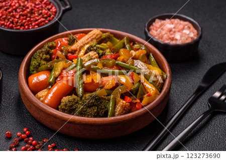 Mix of vegetables corn, carrots, peppers, broccoli, onions in teriyaki sauce Mix of vegetables corn, carrots, peppers, broccoli, onions in teriyaki sauce 123273690