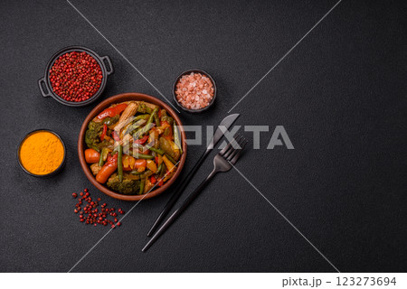 Mix of vegetables corn, carrots, peppers, broccoli, onions in teriyaki sauce 123273694