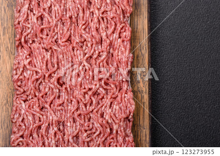 Fresh raw ground minced beef with salt and spices 123273955