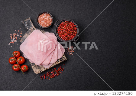 Ham cut into square slices for making delicious nutritious sandwiches Ham cut into square slices for making delicious nutritious sandwiches 123274180
