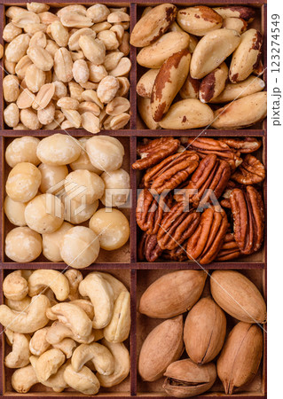 Box with various nuts cashew, macadamia, peanut, cedar, pecan, walnut, brazil, hazelnut Box with various nuts cashew, macadamia, peanut, cedar, pecan, walnut, brazil, hazelnut 123274549