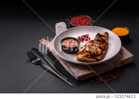 Grilled mackerel fillets with cheese, salt, spices and herbs Grilled mackerel fillets with cheese, salt, spices and herbs 123274613