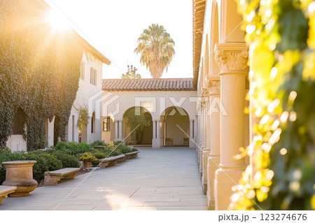 Renaissance stone courtyard with fountain and ornate archways 123274676