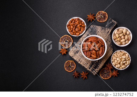 Delicious nutritious pecan nuts in ceramic bowl 123274752