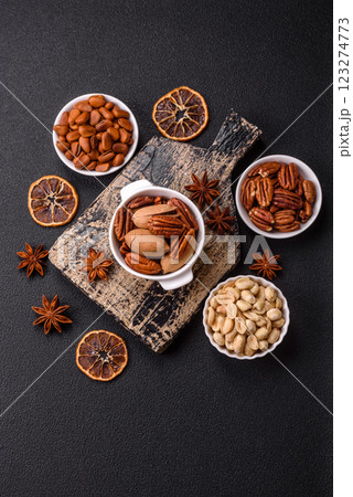 Delicious nutritious pecan nuts in ceramic bowl Delicious nutritious pecan nuts in ceramic bowl 123274773