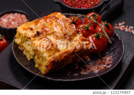 Lasagna or pasta layered with meat, cheese, salt, spices and herbs Lasagna or pasta layered with meat, cheese, salt, spices and herbs 123274907