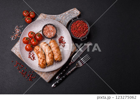 Grilled sausages with spices and herbs Grilled sausages with spices and herbs 123275062