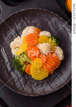 Delicious fresh vegetables steamed carrots, broccoli, cauliflower 123275298