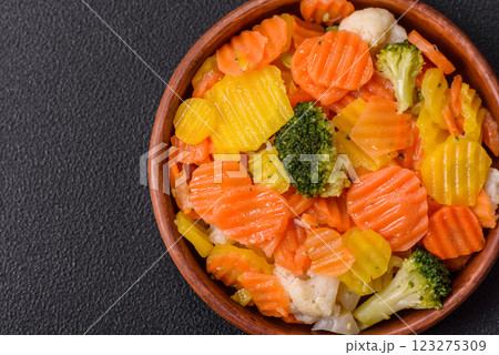 Delicious fresh vegetables steamed carrots, broccoli, cauliflower 123275309