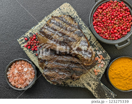 Grilled beef steak with salt, spices and herbs 123275339