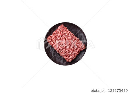 Fresh raw ground minced beef with salt and spices 123275459