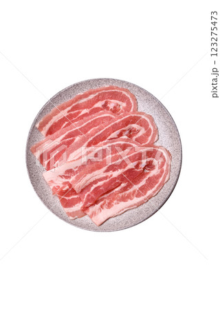 Fresh raw bacon sliced with spices and herbs Fresh raw bacon sliced with spices and herbs 123275473
