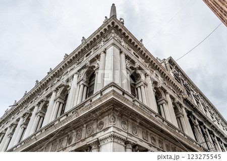 The intricate architectural details of the New Procuracies are prominently displayed at Saint Marc Square in Venice, showcasing the historical grandeur of the location. The intricate architectural details of the New Procuracies are prominently displayed at Saint Marc Square in Venice, showcasing the historical grandeur of the location. 123275545