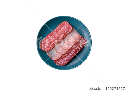 Delicious fresh smoked sausages cut with slices 123275627