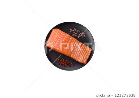 Fresh raw salmon steak with spices and herbs 123275639