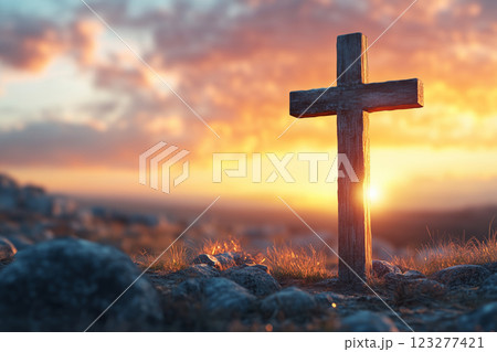 Crucifix with illuminated background under a sunset sky Crucifix with illuminated background under a sunset sky 123277421