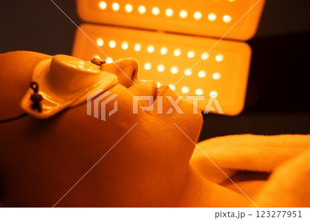 Relaxation during light therapy session at a wellness center Relaxation during light therapy session at a wellness center 123277951