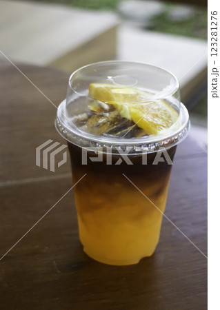 Iced black orange coffee drink Iced black orange coffee drink 123281276