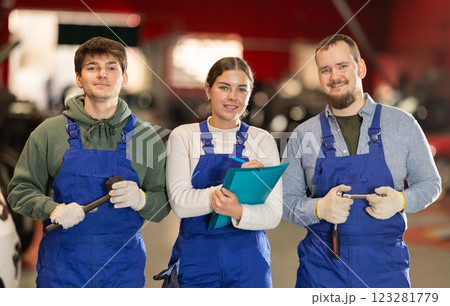 Employees go to the car service Employees go to the car service 123281779