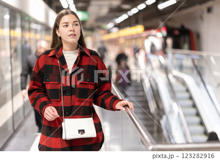 Woman changing to the subway 123282916