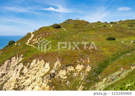 Hiking on the rocky cliffs of Cabo da Roca at the Atlantic coast of Portugal, Europe 123284469